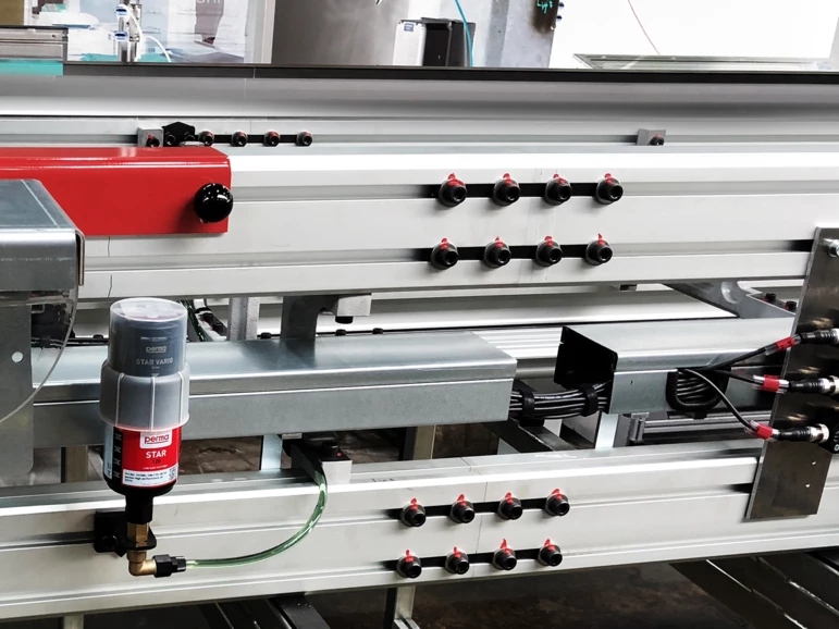 remote mounted perma STAR VARIO automatic lubricator mounted on manufacuring equipment for the automotive industry