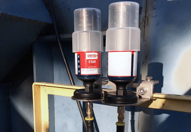 two remote mounted single point lubricators