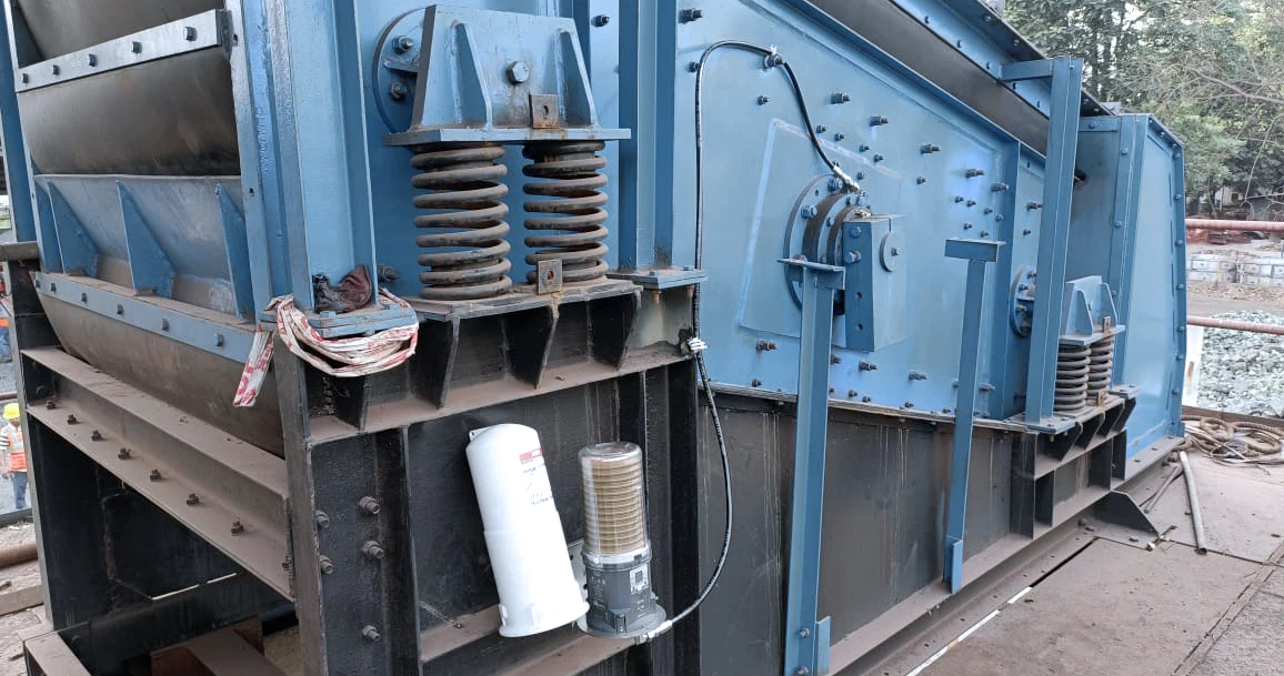 perma ULTRA automatic lubrication system connected to machinery with heavy duty hose