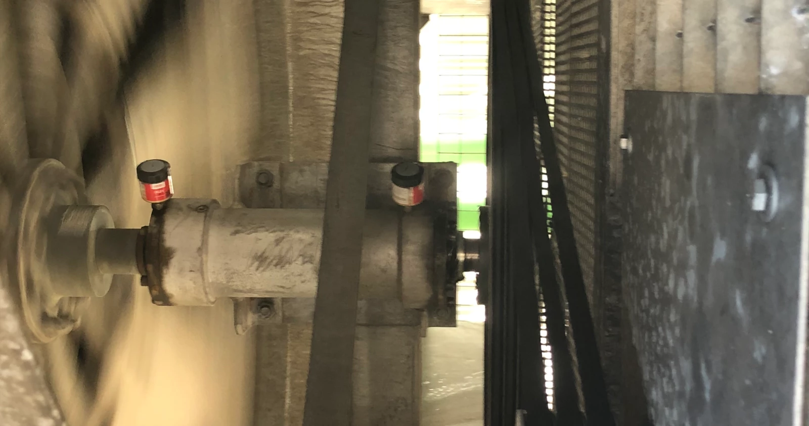two gas driven lubricators installed on equipement in the automotive industry