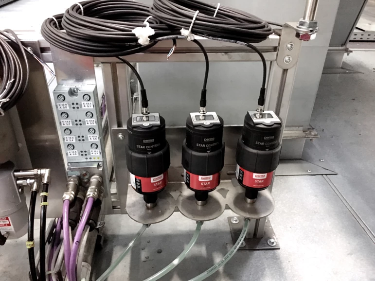 three perma STAR CONTROL automatic lubrication systems