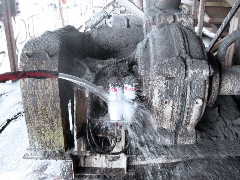 A hose spraying on covered single point lubricators