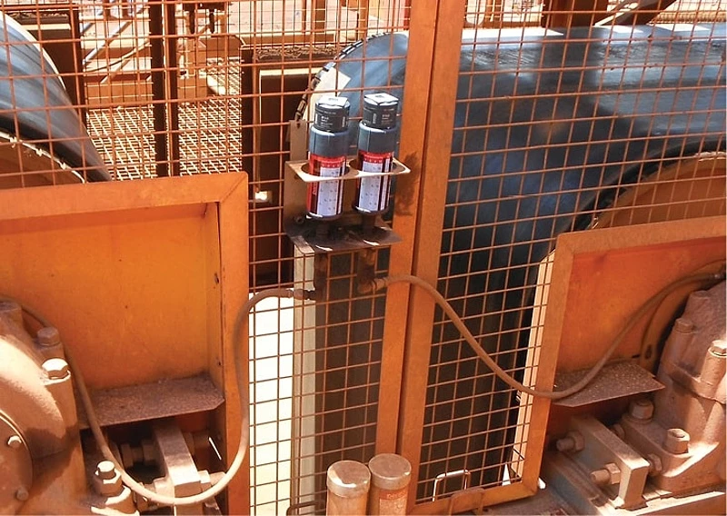 two perma STAR VARIOS mounted remotely to a conveyor