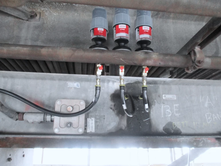 three remote mounted perma STAR VARIO auto lubers